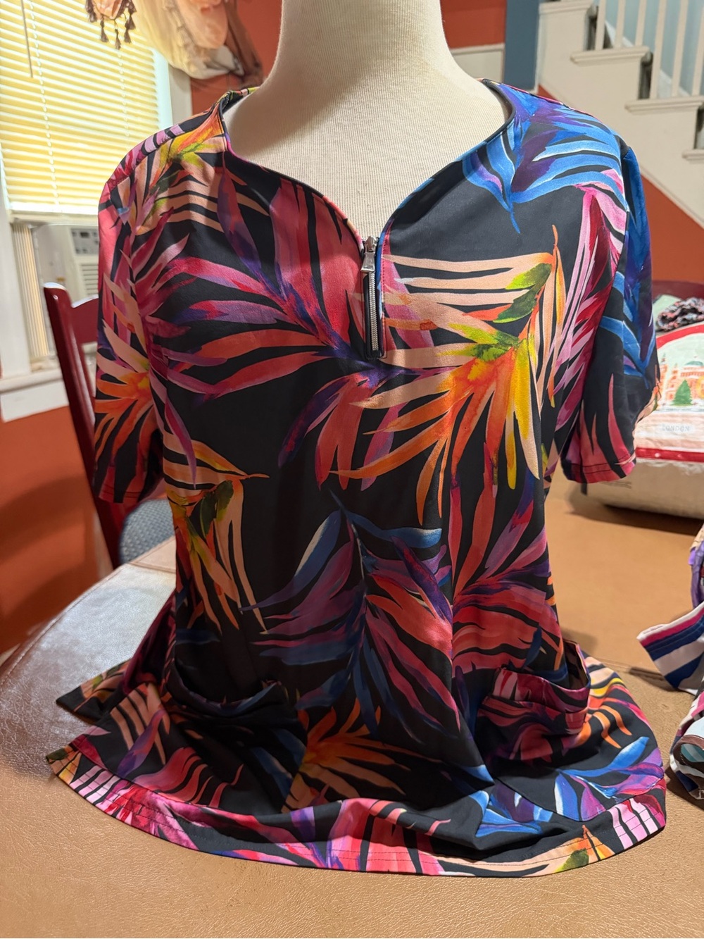 Tropical Print Zip-Neck Scrub Top — Black with Multicolor Leaf Design